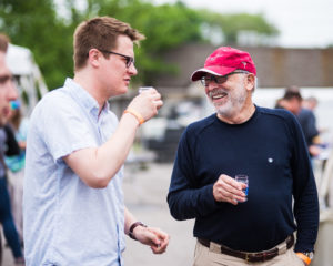Mt. Pleasant Craft Beer Festival 2018 in Downtown Mt. Pleasant, Michigan. Two gentlemen enjoying Michigan crafted beer and good conversation.