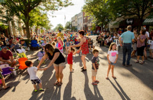 Max and Emily's Summer Concert Series 2018 families and friends dancing in the streets of Downtown Mt. Pleasant.
