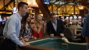A group of friends celebrate at a crabs table inside Soaring Eagle Casino and Resort in Mt. Pleasant, Michigan.