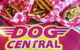 Two hot dogs and a basket of french fries from Dog Central, a hot dog restaurant in downtown Mt. Pleasant, Michigan.