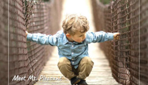 The cover of the 2020 Mt. Pleasant Area Visitors Guide featuring a photo of a young boy, on a rope, swinging bridge at Deerfield Nature Park in Mt. Pleasant, Michigan.