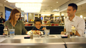 A family of three is dining at a restaurant inside Soaring Eagle Casino in Mt. Pleasant, Michigan.