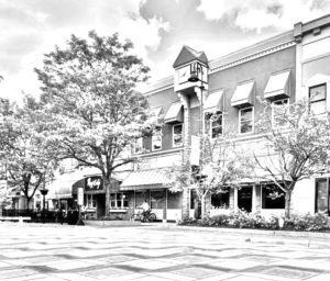 A black and white coloring page of Downtown Mt. Pleasant, Michigan.
