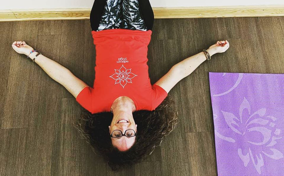 RedBloom Yoga Mt. Pleasant owner Kristin Batzner sits in the studio in Downtown Mt. Pleasant, Michigan.