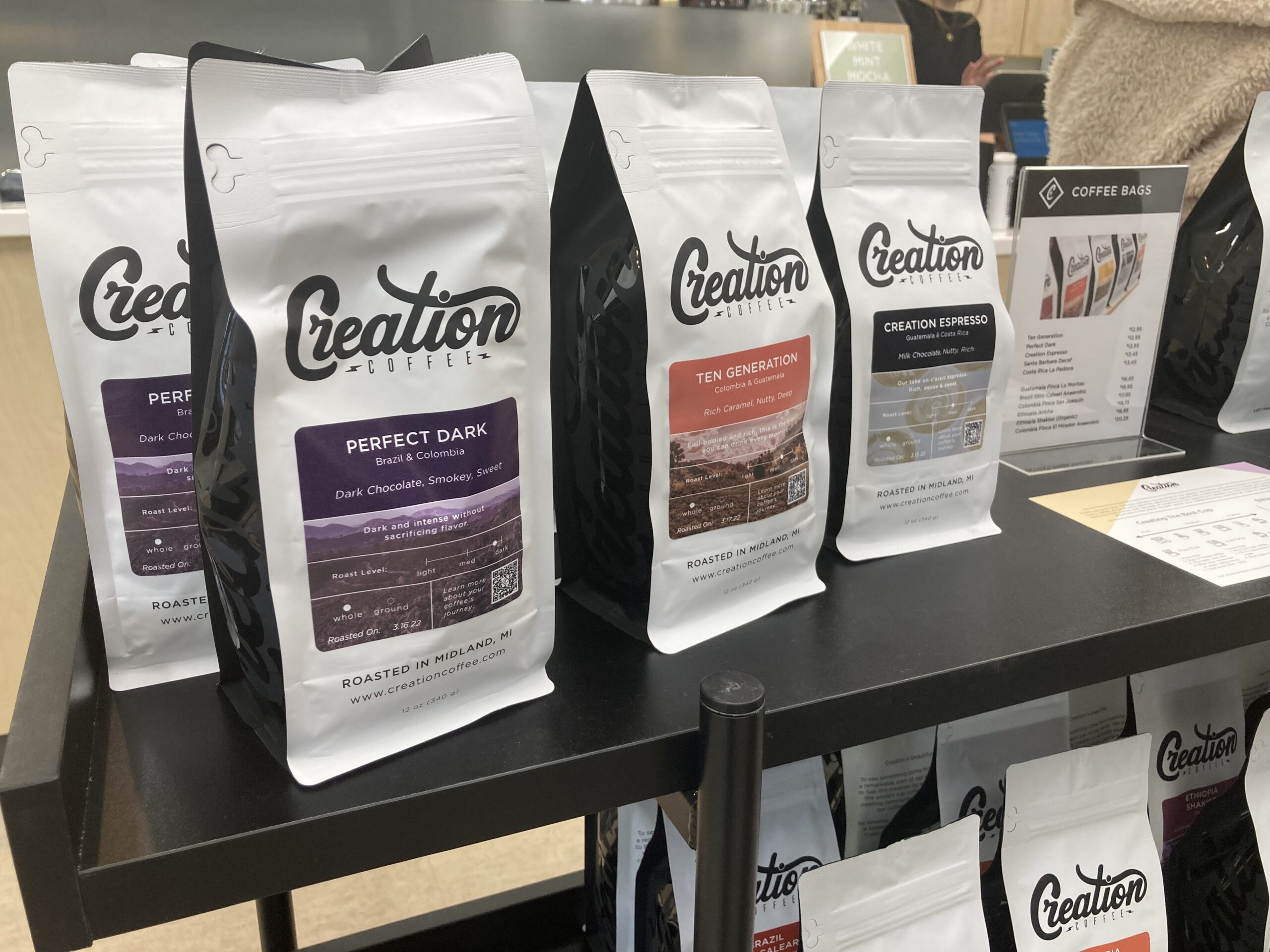 Bags of coffee for sale at Creation Coffee