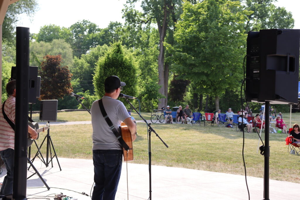 Performers on stage at Music in the Park.