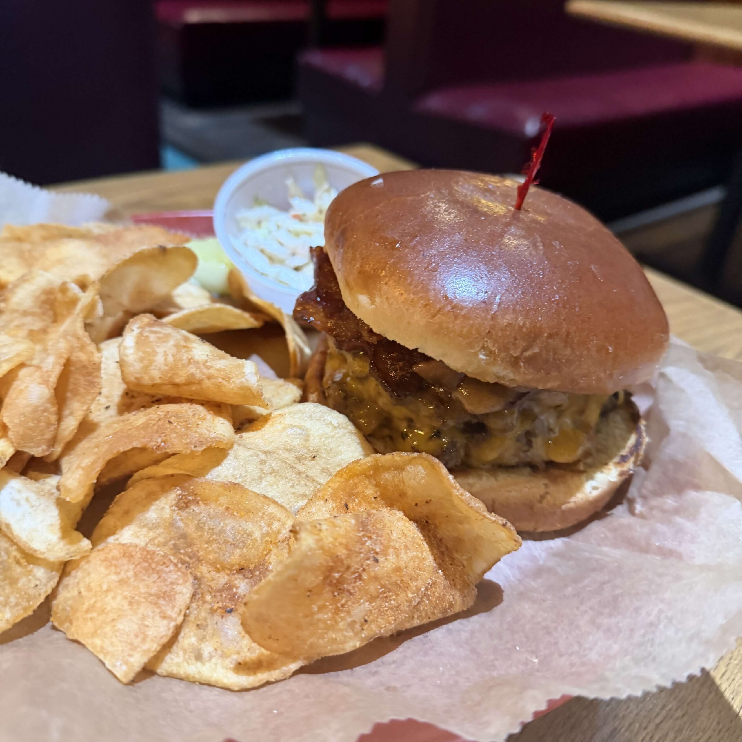 Hunter Ale House Maple Smash Burger with crispy cheese, maple, and homemade chips